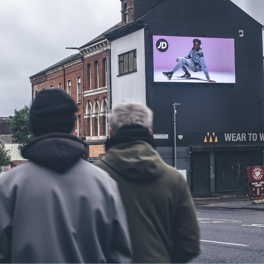 Pedestrians viewing our Clifton Street DOOH screen